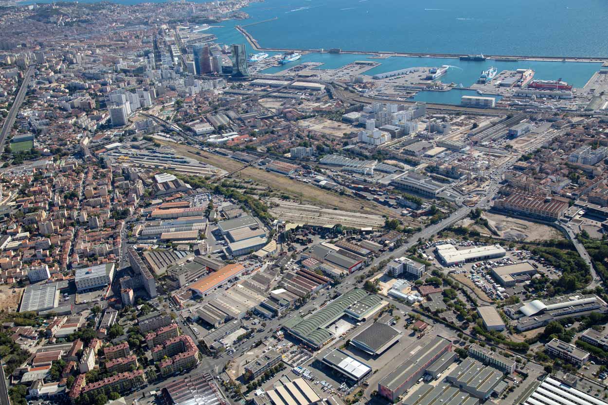 " Marseille Le Canet, a former train station, is at the heart of a vast urban renewal project. In 2030, work will begin on transforming this 24-hectare railway site sold by SNCF Immobilier into a large park that will become a green oasis for the city’s inhabitants. "